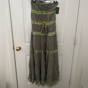 Long dark green skirt with sequin design